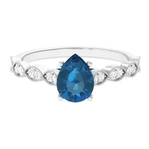 1.25 CT Teardrop London Blue Topaz Solitaire Ring with Diamond