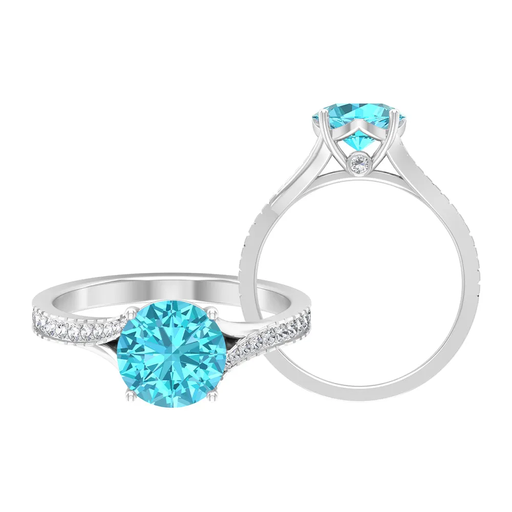 Split Shank Swiss Blue Topaz Solitaire Engagement Ring with Diamond Accent