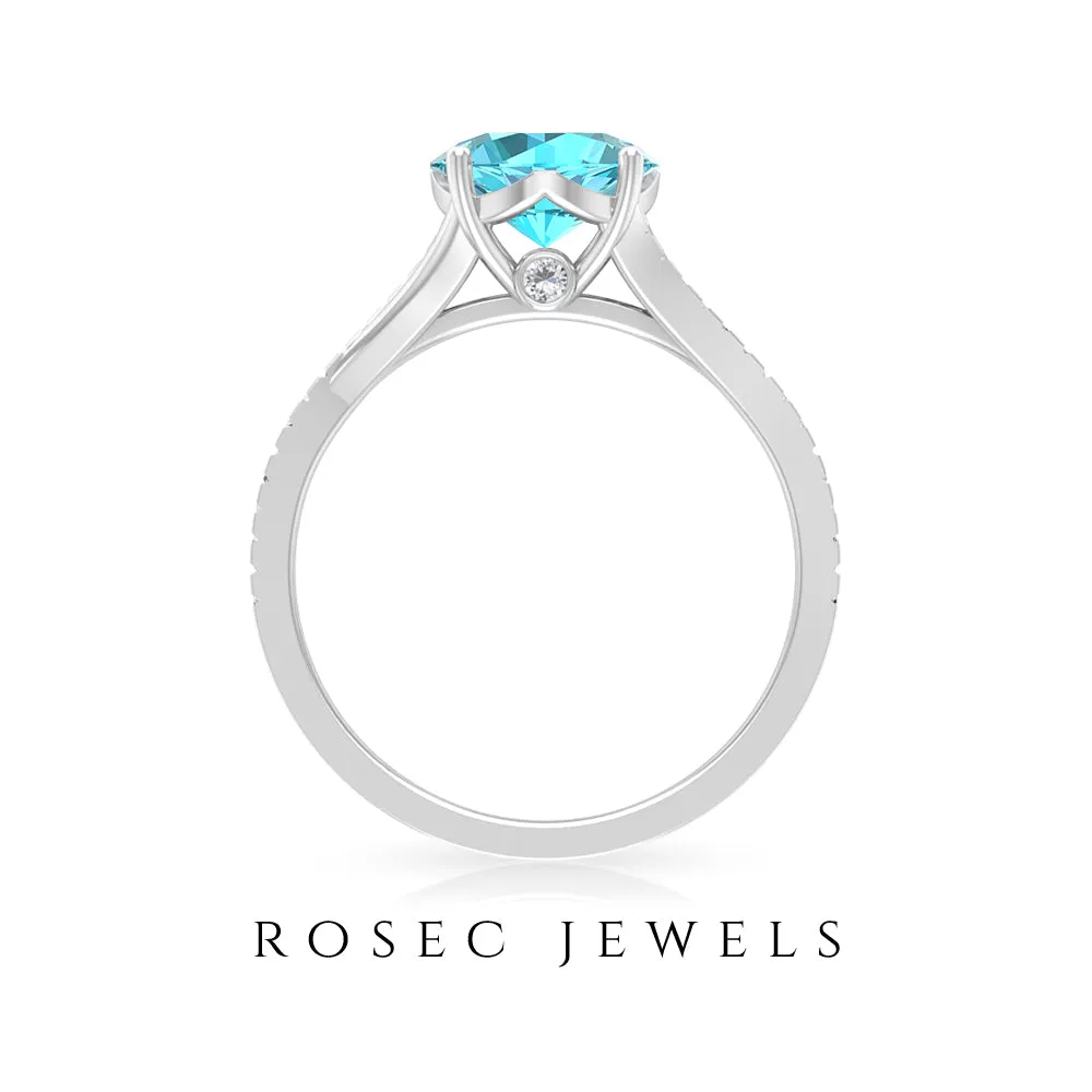 Split Shank Swiss Blue Topaz Solitaire Engagement Ring with Diamond Accent