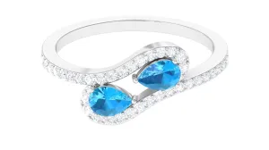 Vintage Inspired Swiss Blue Topaz Bypass Ring with Diamond